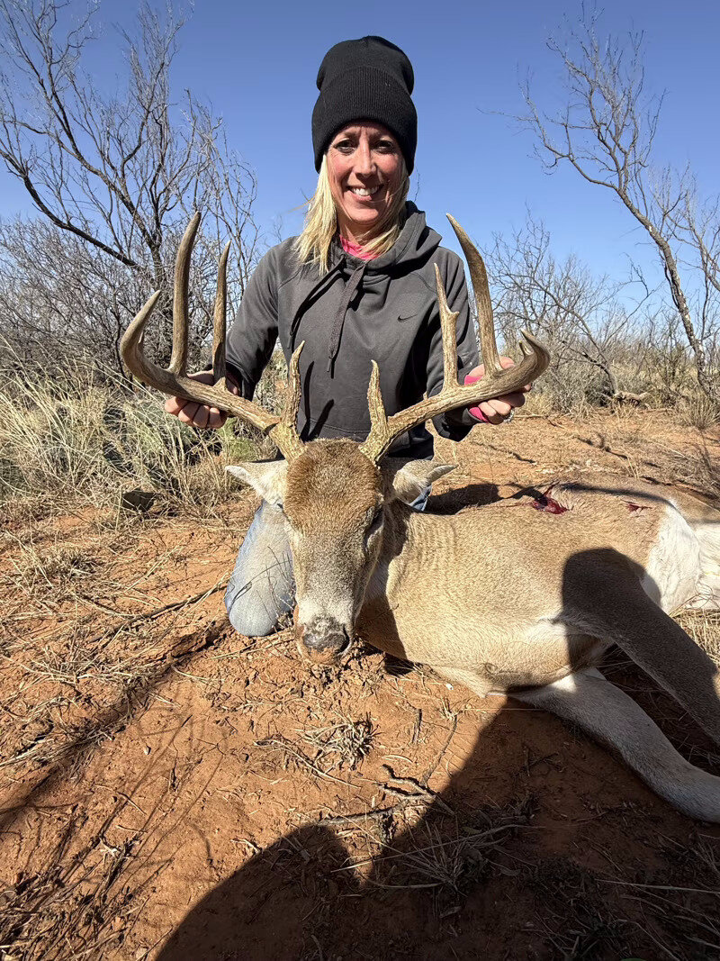 Hunter with a West Texas free-range whitetail